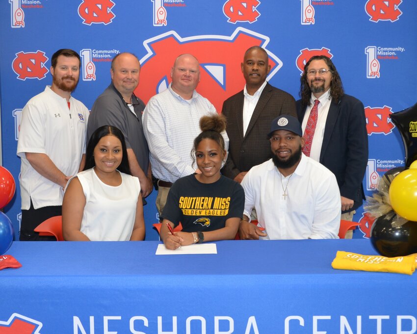 Neshoba Central’s Imaria Wilson signed with University of Southern Mississippi to further her education and be a member of the Gold Eagles Band. Pictured, front row from left, are her mother Ashley Greer, Imaria Wilson and Allen Greer (Back) Assistant Principal Jonathan Walker, Principal Jason Gentry, Assistant Principal Brent Pouncy Assistant Principal LaShon Horne, and Band Director Daniel Wade.